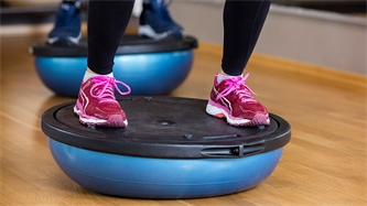 3 Exercises On The Bosu Ball To Improve Your Balance